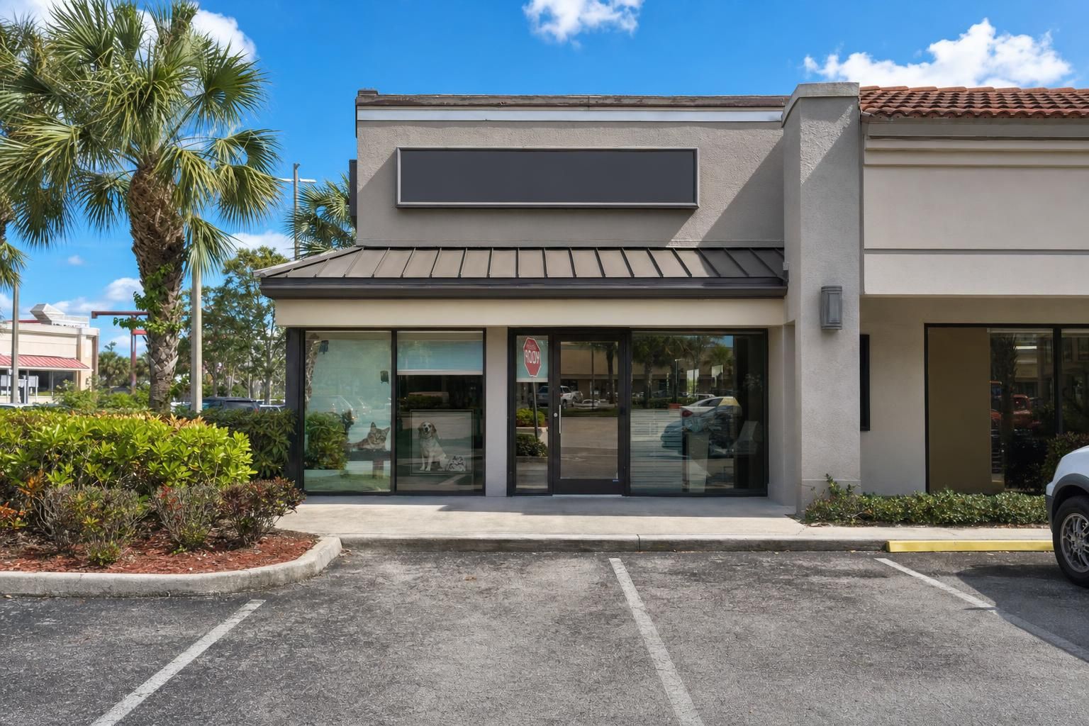 Exterior of a small veterinary clinic building in Lantana, Florida